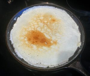 Light, golden brown coloring is a sign it is ready to come off the pan.