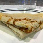 Picture of 2 folded Swedish pancakes on a plate