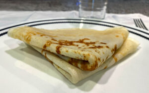 Picture of 2 folded Swedish pancakes on a plate